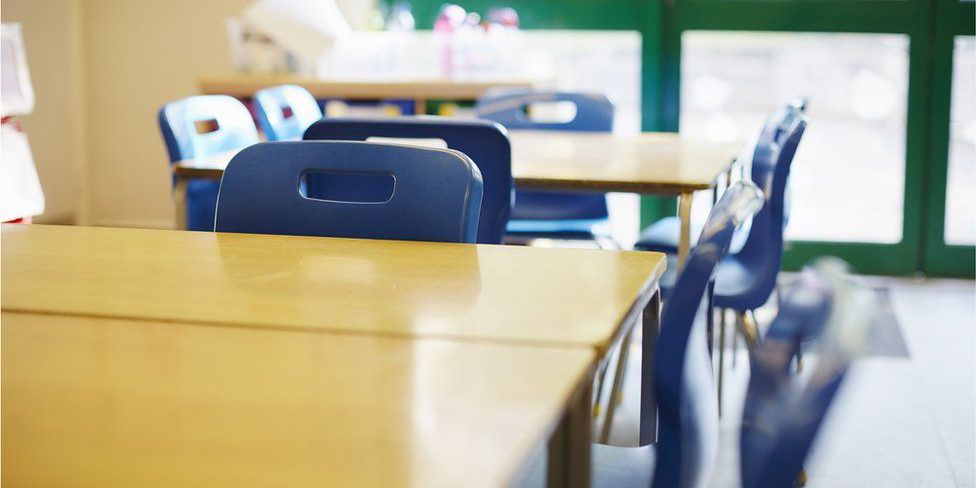 _115631731_emptyclassroom_gettyimages-1140101108